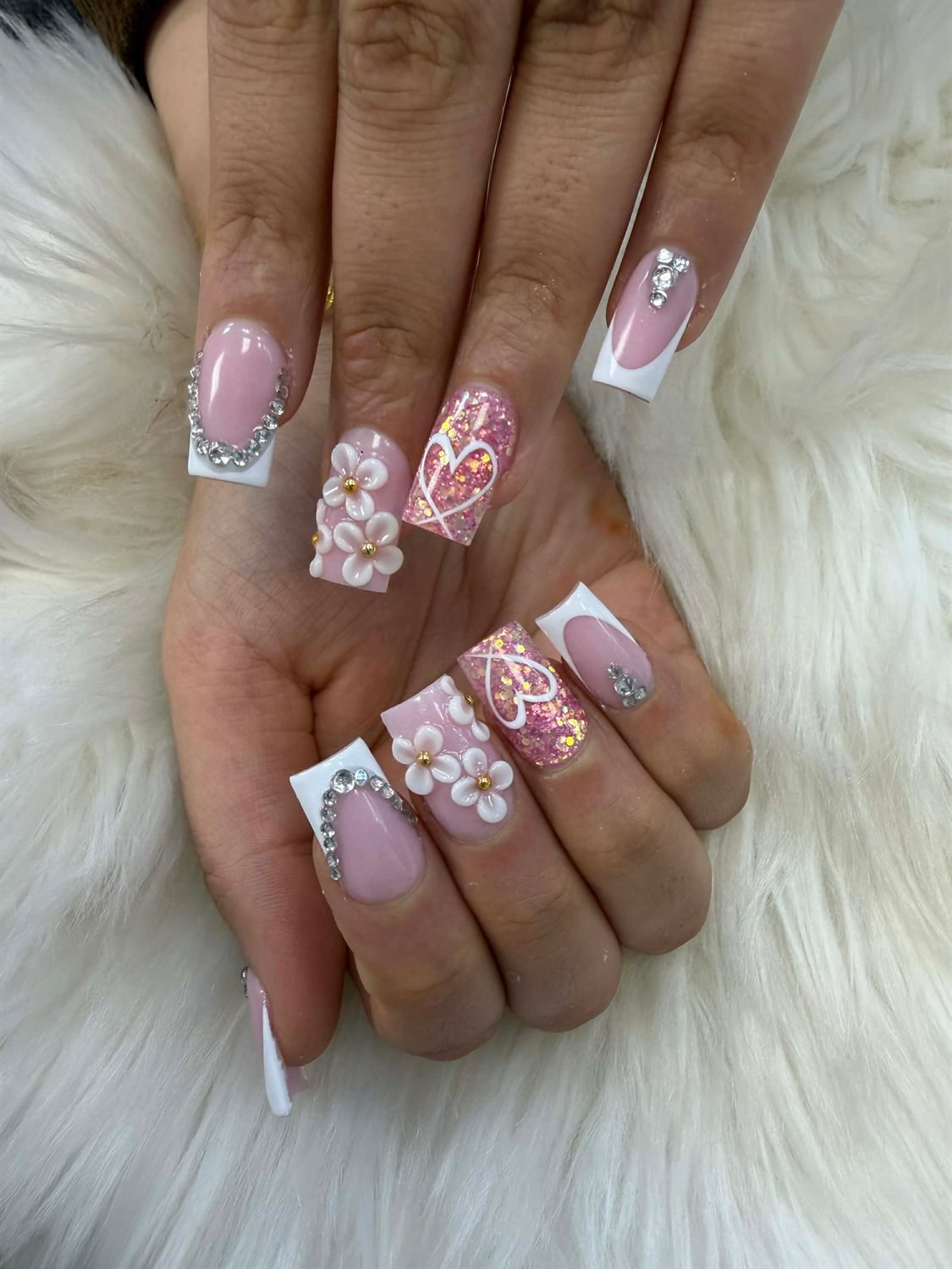 Pink square nails with 3D flowers, crystals and white tips